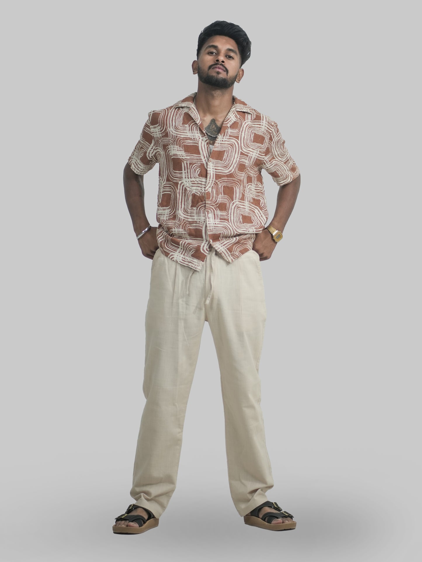 Men’s Beige Linen Trousers styled on model smart casual outfit