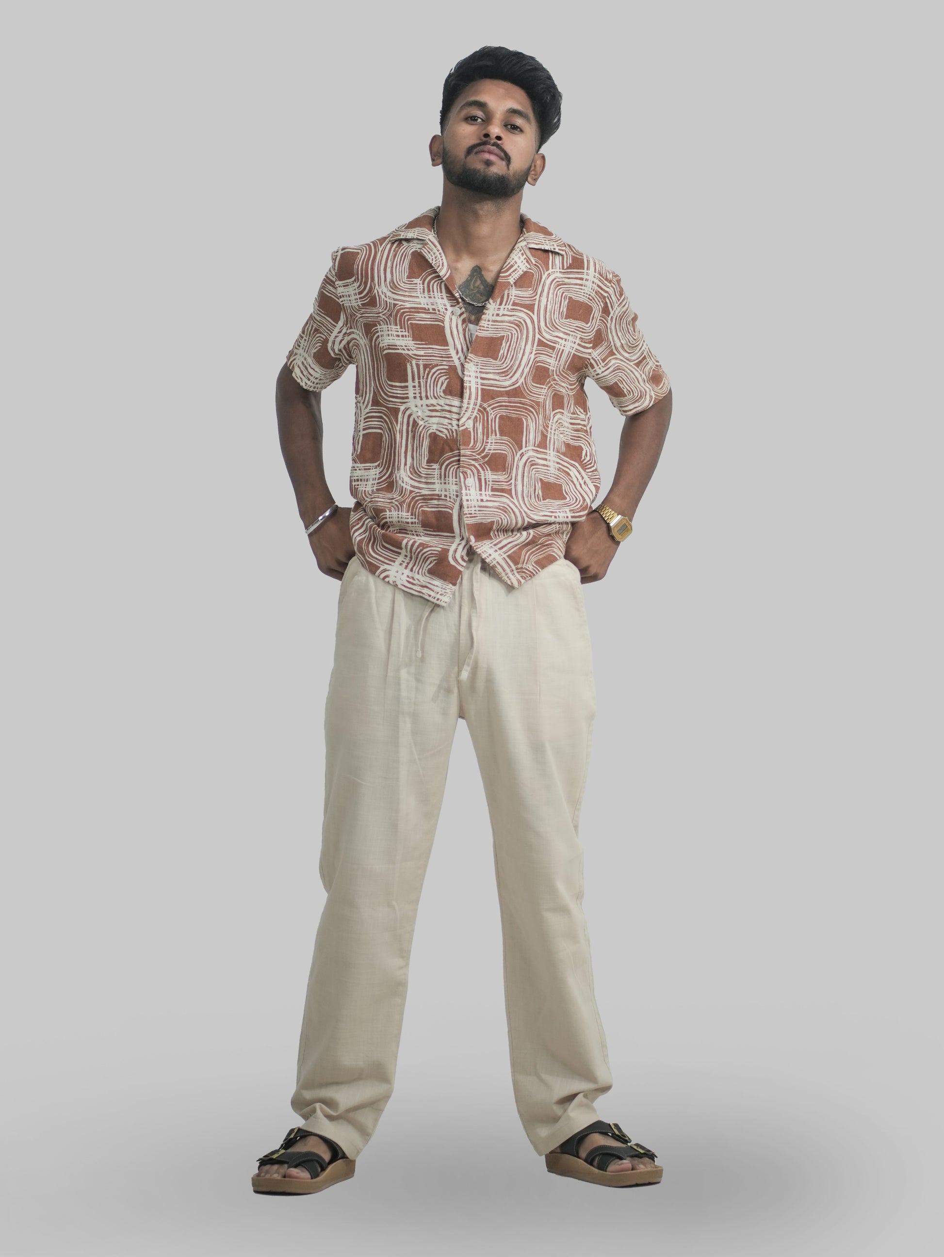 Men’s Beige Linen Trousers styled on model smart casual outfit