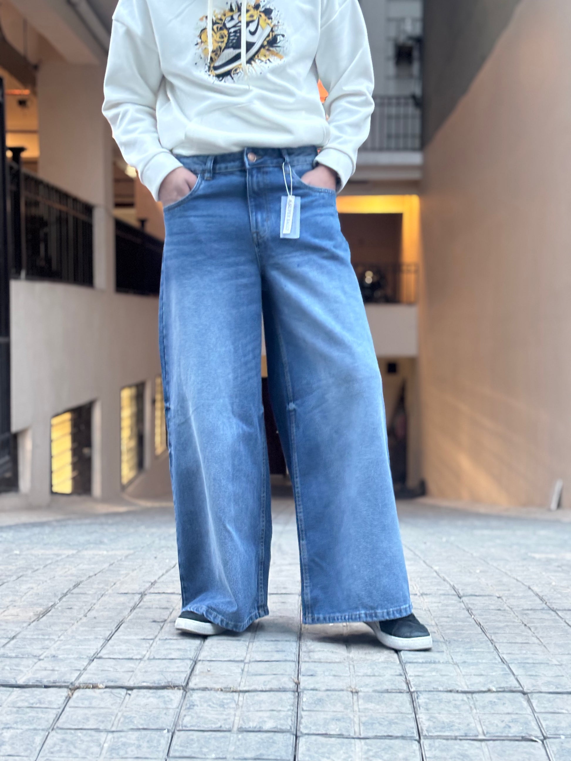 Men’s Baggy Fit Ultra Wide Leg Jeans in Mid Blue Wash Front View