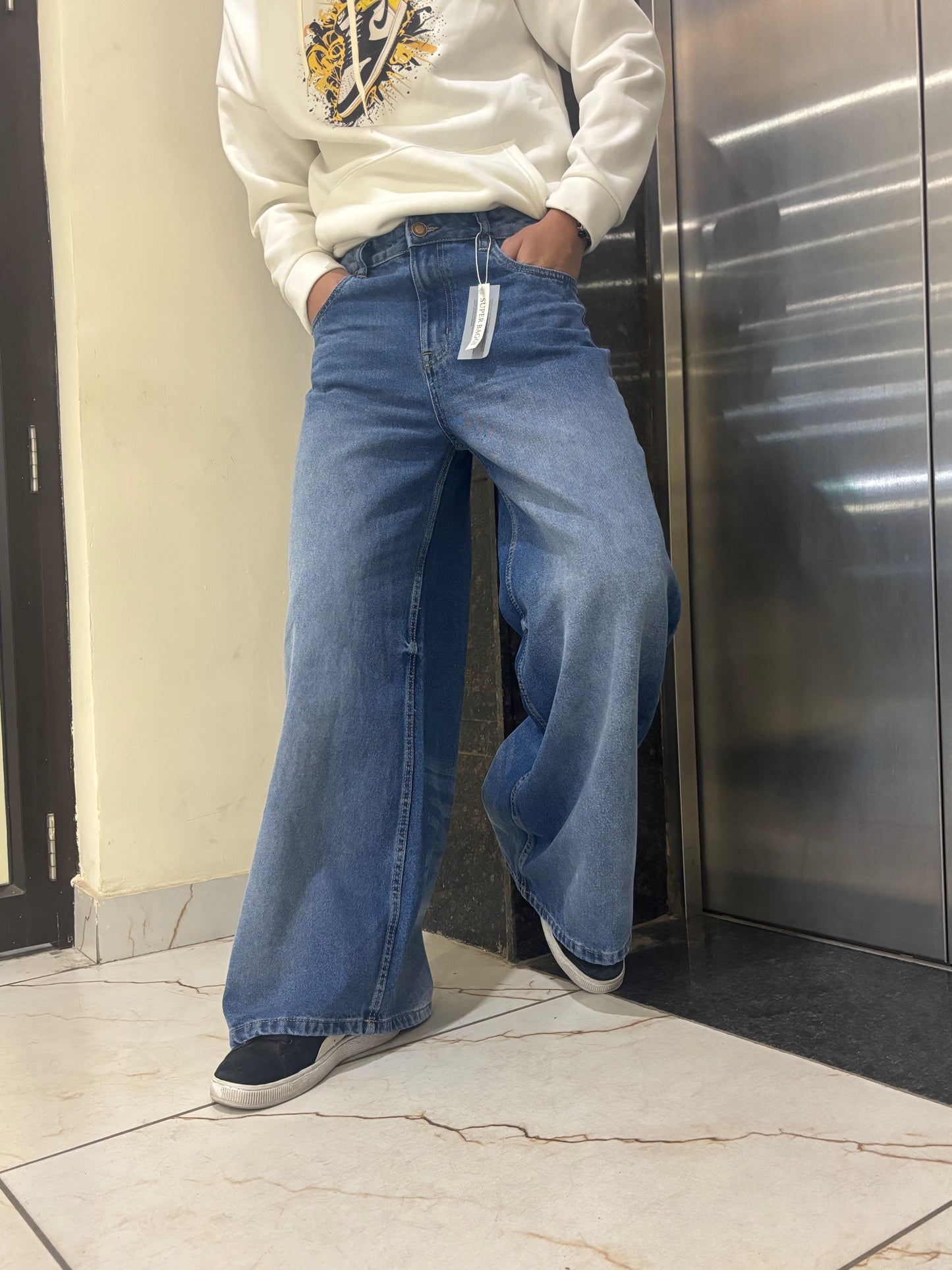 Men’s Baggy Fit Ultra Wide Leg Jeans in Mid Blue Wash Side View