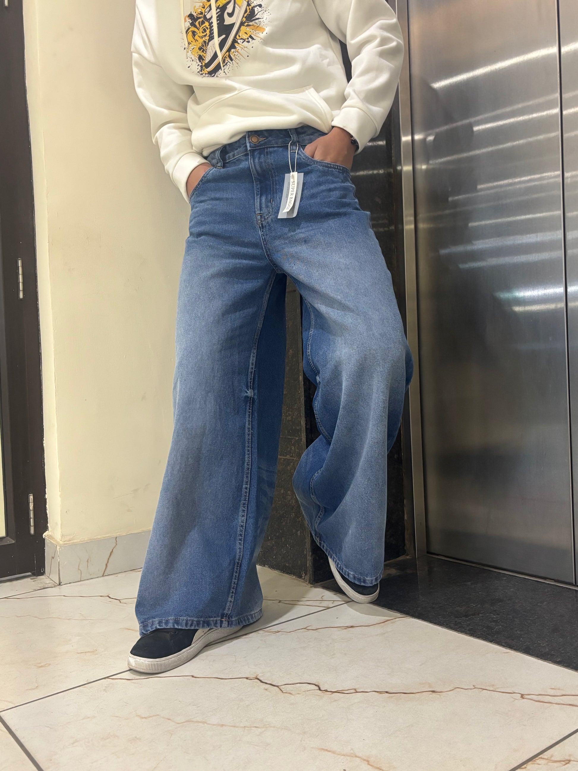 Men’s Baggy Fit Ultra Wide Leg Jeans in Mid Blue Wash Side View